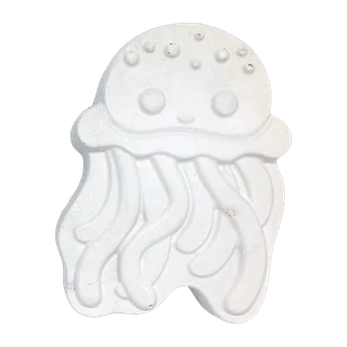 The jellyfish casting, unpainted white plaster: a domed jellyfish with a spotted bell and trailing tentacles.