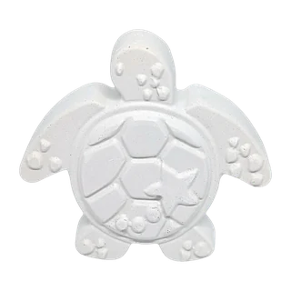 The turtle casting, unpainted white plaster: a sea turtle from above, patterned shell and four flippers.
